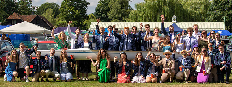 boat club members with boat